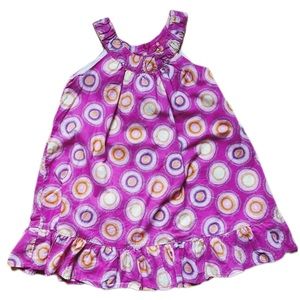 Pink dress with poke-a-dots and ruffle by Shrinking Violet